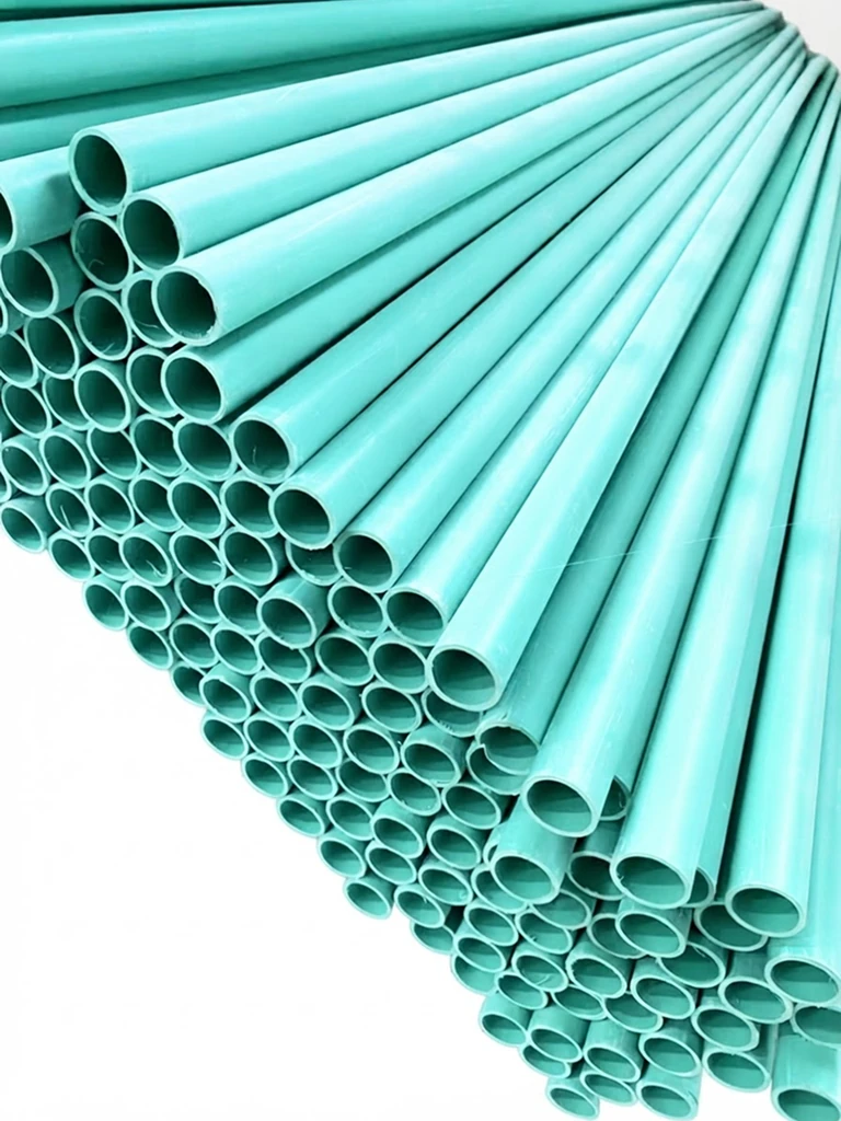 SNGT 32 mm PVC pipes stacked at the factory